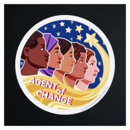 A round sticker depicting five women heads in front of a night sky. Within the tail of a meteor you can read "Agent of Change"